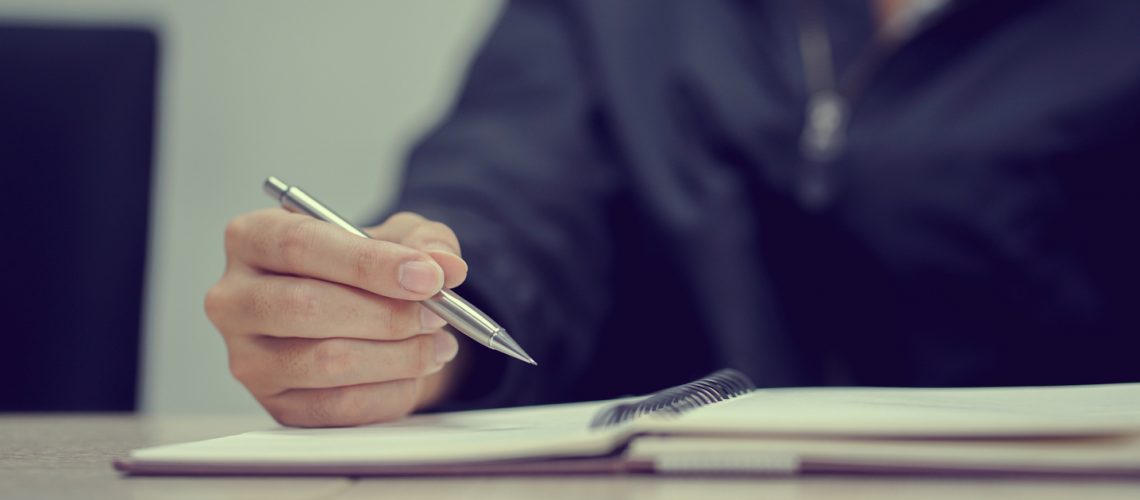 Man looking over legal documents